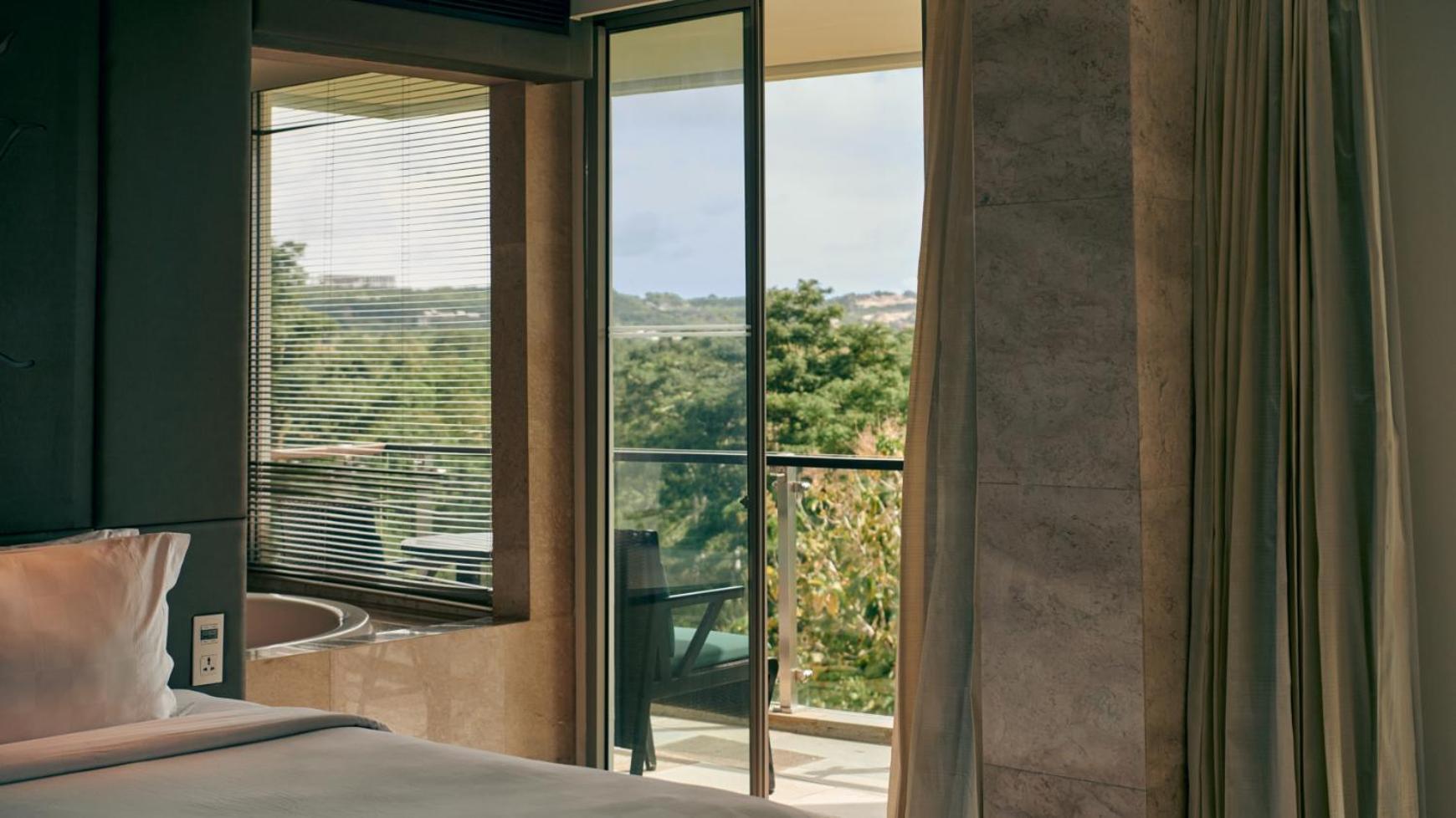 Hotel Rimba By Ayana Bali Jimbaran Exterior foto A window with integral blinds